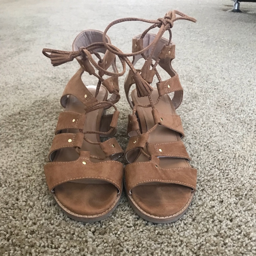 Size 9, small heeled, gladiator-like sandals
